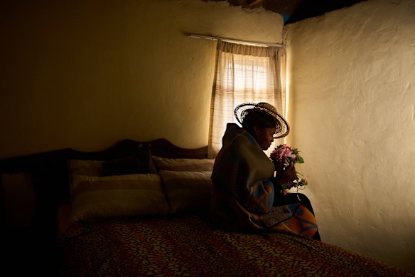 Lisebo Lechela, 53, an HIV-positive sex worker, poses for a portrait in her house in Maputsoe, Lesotho.