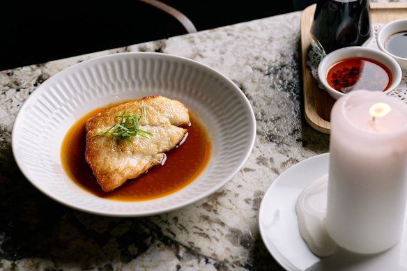 Pan-fried coral trout in a soy, shallot and ginger sauce.