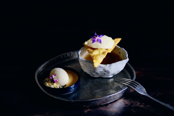 Yuzu ice cream with mandarin puree. Yuzu ricotta cream, peach soup, and gyoza crisp.
