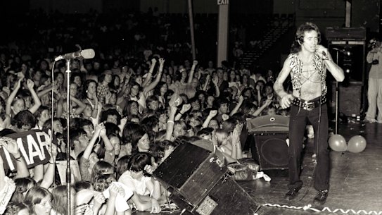 Bon Scott on stage with the band at the Hordern Pavilion in Sydney on December 12, 1976.