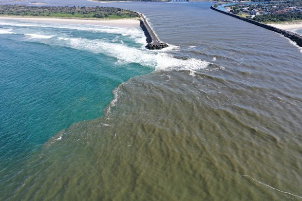 Sediment is seen extending out into the ocean from the Richmond River mouth at Ballina.