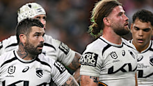 Broncos players Adam Reynolds and Patrick Carrigan react during a loss to the Warriors.
