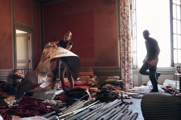 A first-floor bedroom used to store fabrics, including many of the building’s curtains.  