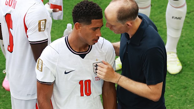  Thomas Tuchel, Manager of England, speaks with Jude Bellingham.