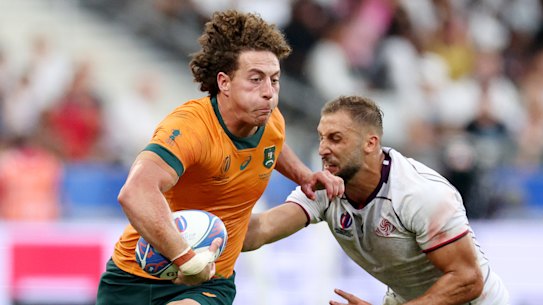 Mark Nawaqanitawase taking on Georgia during the Rugby World Cup in September.