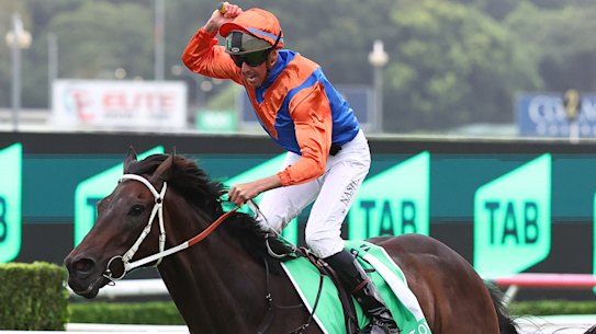 Nash Rawiller salutes as Think It Over holds off Fangirl in the Verry Elleegant Stakes.