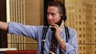 Michael Douglas speaks on the telephone in a scene from the film ‘Wall Street’.