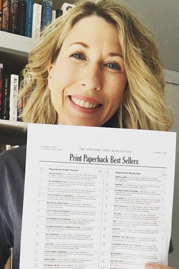 Lester with the 2019 NYT bestseller list on which she debuted. She bought a Tiffany &amp; Co. watch to celebrate.