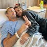 Lions legend Jonathan Brown recovers from brain tumour surgery in hospital, pictured with his wife Kylie.