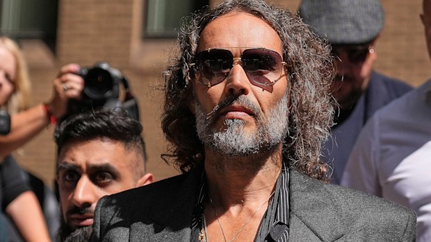 English comedian and actor Russell Brand leaves Southwark Crown Court.