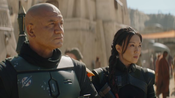 Boba Fett (Temuera Morrison) and Fennec Shand (Ming-Na Wen) on the mean streets of Tatooine.