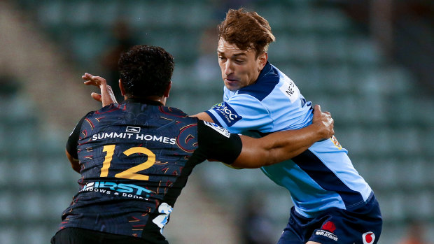 Ramm is tackled during the Waratahs' loss to the Chiefs. 