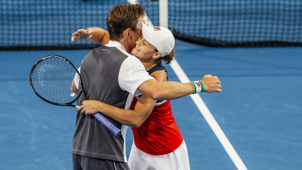 Matt Ebden and Ashleigh Barty celebrate their win in the mixed doubles against Spain.