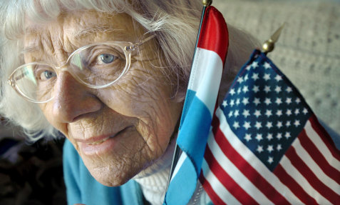 Diet Eman poses for a photograph in 2007 at her home in Grand Rapids, Michigan, before becoming a US citizen at the age of 86.