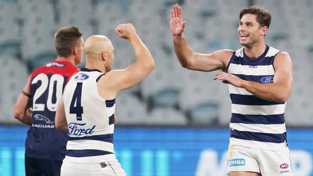 Top Cat: Geelong forward Tom Hawkins celebrates a major during the round 4 win over Melbourne at the MCG.