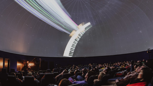 Visual elements were a major feature of Dan Toepfer's performance at the Melbourne Planetarium.
