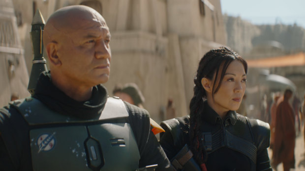 Boba Fett (Temuera Morrison) and Fennec Shand (Ming-Na Wen) on the mean streets of Tatooine.