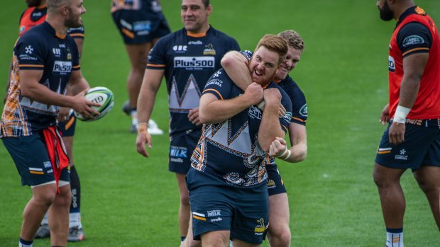 Tom Ross, front, and Tom Cusack are two of seven Canberra players in the Brumbies' side this week. Ross will make his Super Rugby debut as a 20-year-old on Friday night.