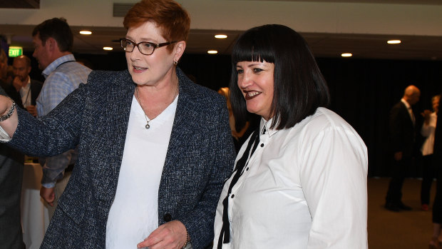 "It's not simple": Raelene Castle, pictured earlier this month with Australia's Foreign Minister Marise Payne, plays down World League hype.