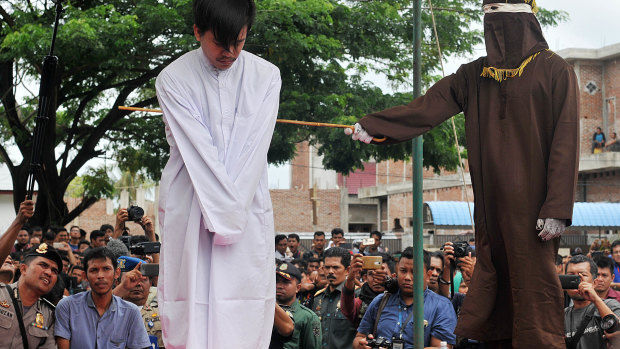 The penalty for homosexual acts in Aceh is up to 100 lashes and 10 months in jail.