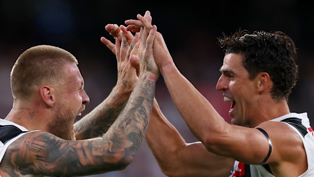 Power play. Jordan De Goey and Scott Pendlebury used to effect off the bench.