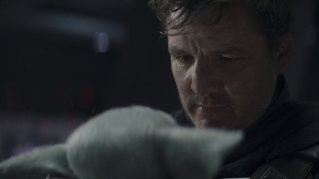 Mando (Pedro Pascal) and Grogu say goodbye in the tearful season finale of The Mandalorian.