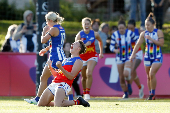 Dakota Davidson of the Lions celebrates a goal against North Melbourne in round seven. 