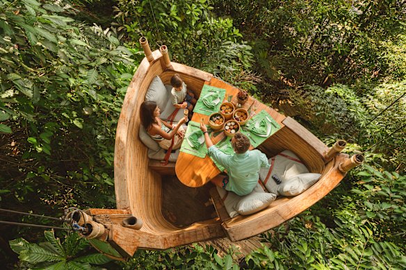 Dining in the treetops at Soneva Kiri.