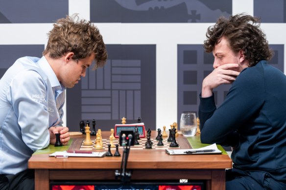 Magnus Carlsen (left) lost with the white pieces to Hans Niemann in the third round of the Sinquefield Cup in St Louis.