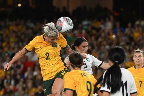 Michelle Heyman heads a goal.