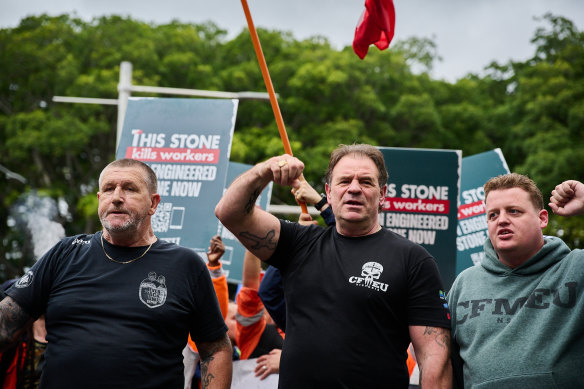 John Setka (centre) quit the CFMEU before the publication of a story detailing bikie and underworld infiltration of construction sites.