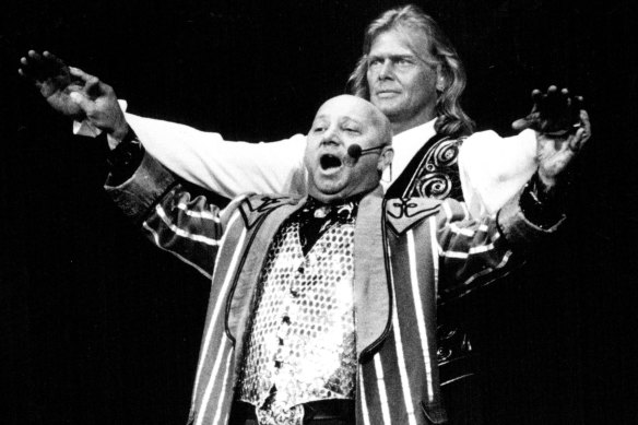 Angry Anderson, as King Herod, and John Farnham, as Jesus, in the 1992 concert version of Jesus Christ Superstar.