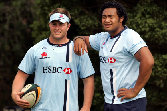 Dan Palmer, pictured with Sekope Kepu in 2007, took up a deal with the Waratahs straight out of high school.