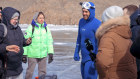 The record breaker speaks with reporters after his dive beneeath the ice.