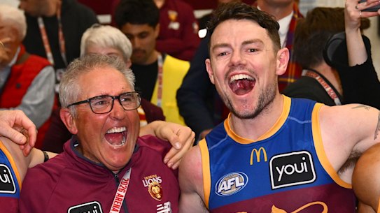 Chris Fagan and Lachie Neale celebrate the Lions preliminary final win.