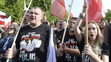Polish nationalists march on the US Embassy, in Warsaw, to protest a push for Poland to compensate Jews whose families lost property during the Holocaust.
