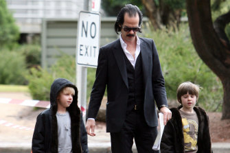 Nick Cave with Arthur, left, and Earl, in 2008. 