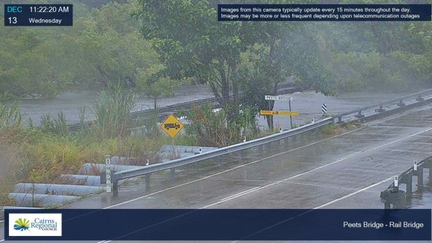 A flood camera shows the rising Mulgrave River in the Goldsborough Valley, near Cairns.