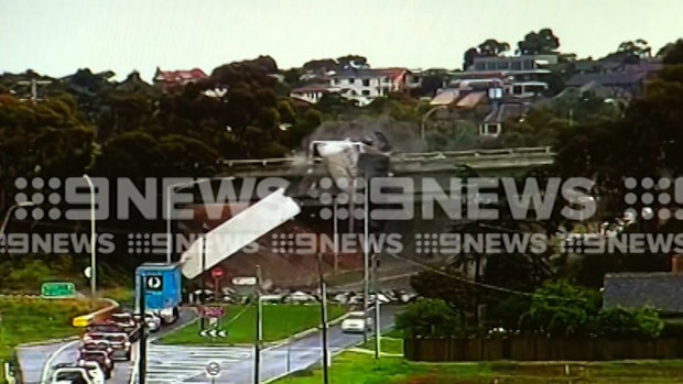 Footage captures the moment the truck crashed into a road barrier. 