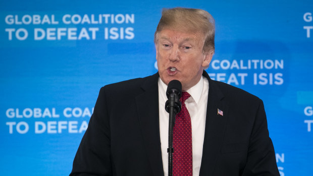 Donald Trump speaks during the Global Coalition to Defeat ISIS meeting in Washington.