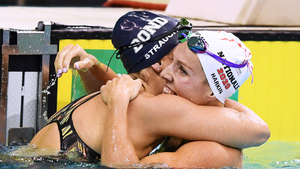 Jenna Strauch hugs Abbey Harkin after winning the Women’s 200 metre breaststroke final.