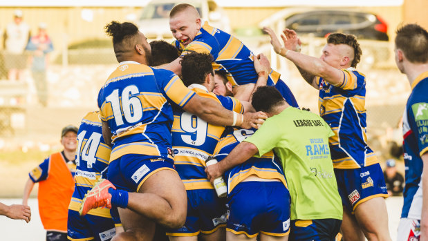 The Rams celebrate the end to a 22-year premiership drought.