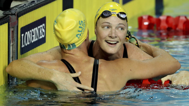 At the finish: Australia's Cate Campbell embraces her sister Bronte.