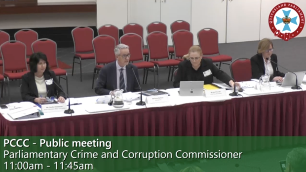 Members of the Queensland Crime and Corruption Commission, including chair Bruce Barbour (second-left), appear at a public meeting of the Parliamentary Crime and Corruption Committee on Friday.