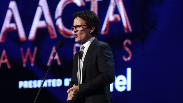 Damon Herriman presents the AACTA Award for best short documentary during the 2019 AACTA Awards.