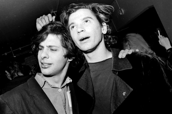 Director Richard Lowenstein, left, with Michael Hutchence in 1986. The pair made many music videos together, plus the feature Dogs in Space.