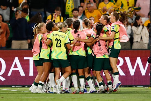 The Matildas celebrate their win.
