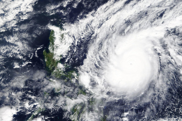 A typhoon locally known as Goni moving around the Philippines.