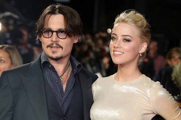 Before it all went bad: Johnny Depp and Amber Heard in 2011. 