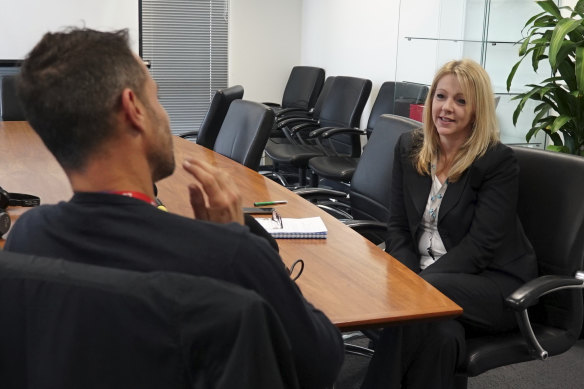 Richard Baker with Australian Federal Police Detective Sergeant Celeste Johnson.  